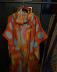 Falling Out Poncho | Outerwear | New Arrivals
