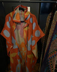 Falling Out Poncho | Outerwear | New Arrivals